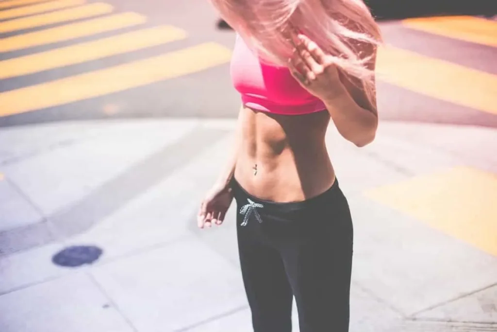 Woman with toned stomach after LA-EMS Body Sculpting Treatment Greater London (Sutton)