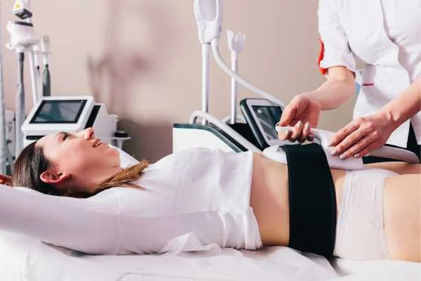 woman having body sculpting to help improve her body image and her mental health Greater London (Sutton)